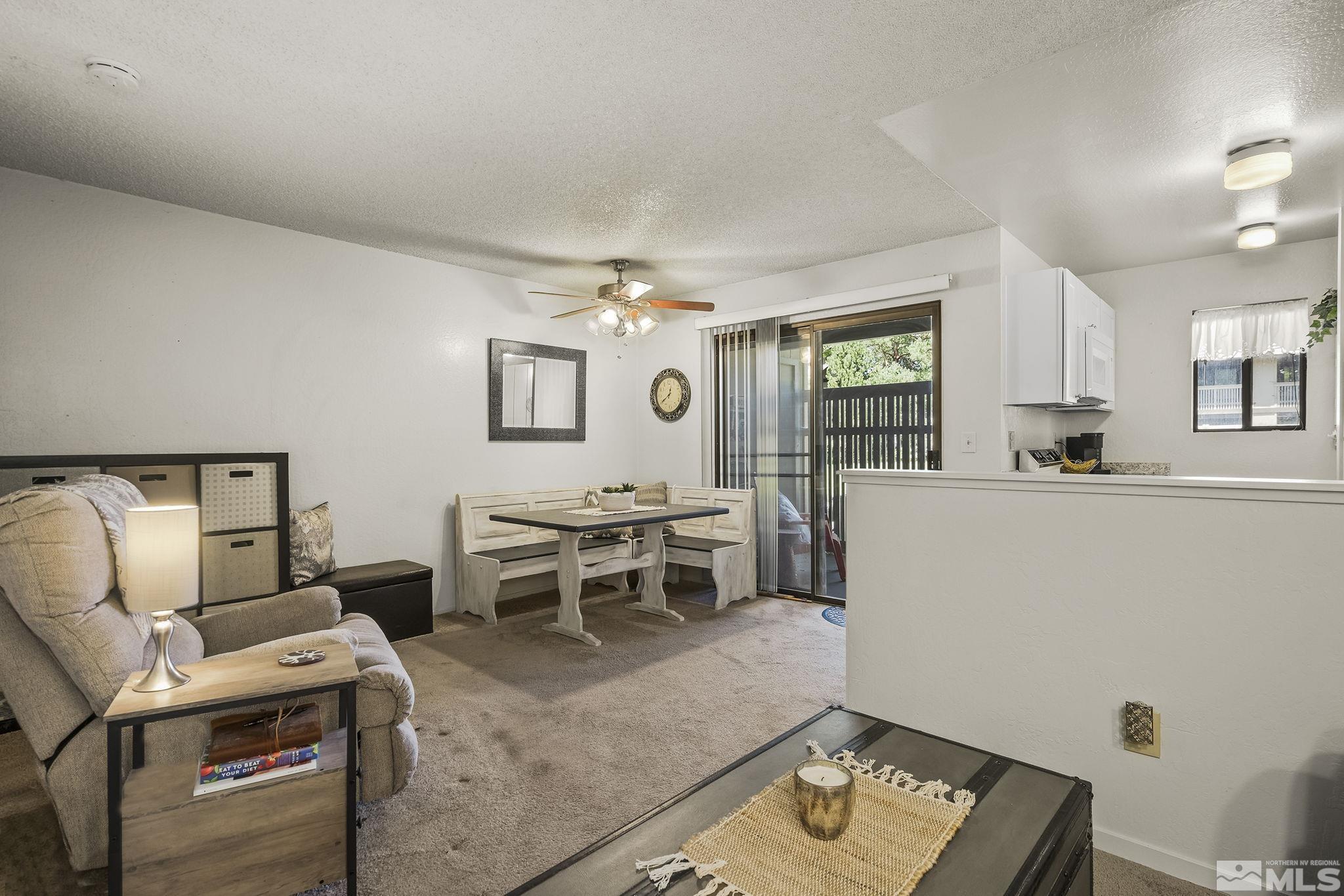 4640 Rio Poco Road Reno, NV 89502 - Photo 7 of 15 a living room with furniture and window