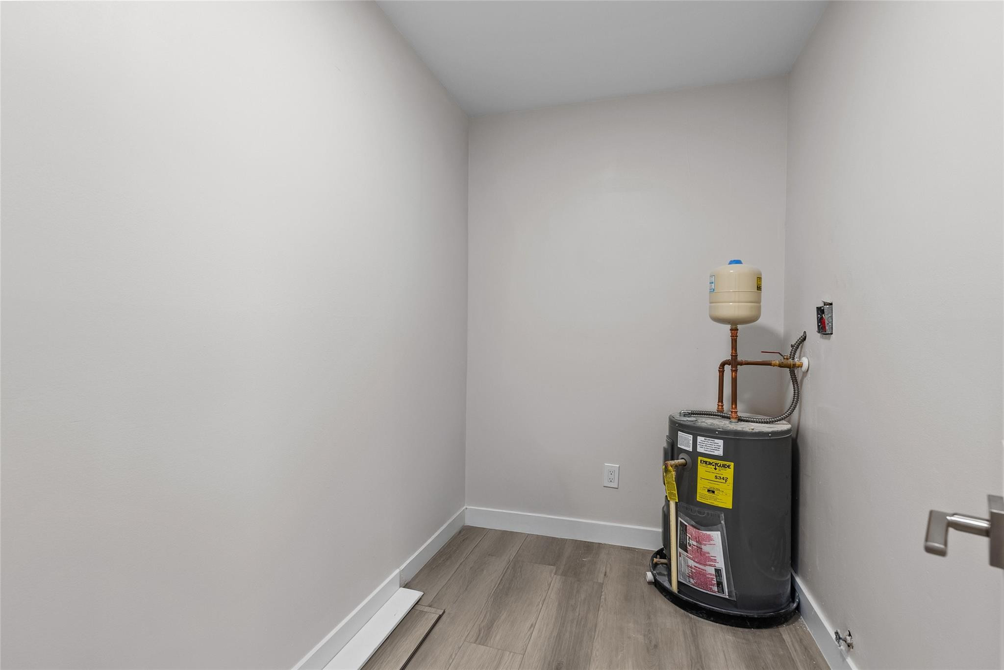 1150 East Sample Road, Unit 202 Pompano Beach, FL 33064 - Photo 18 of 20 a view of a room with wooden floor