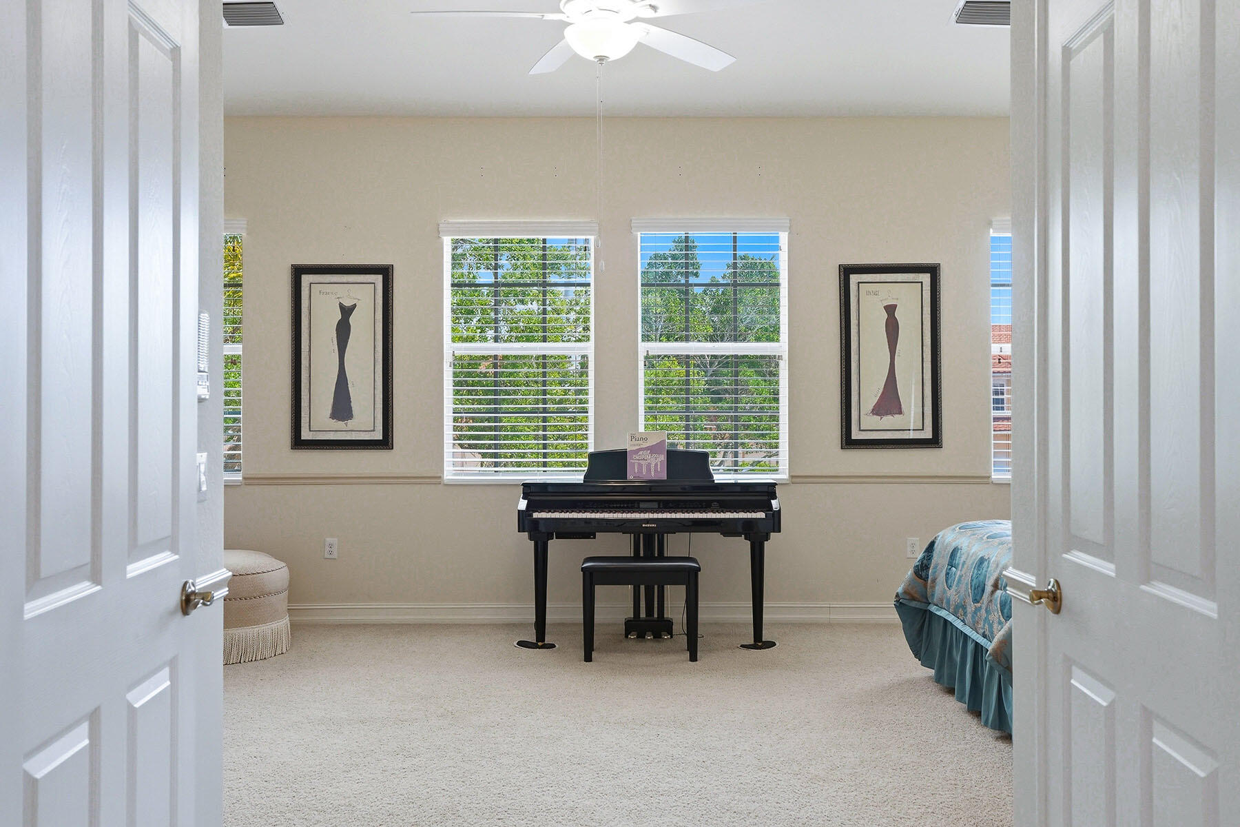 8605 Champions Point, Unit 103 Naples, FL 34113 - Photo 31 of 44 a view of a workspace with furniture and a window