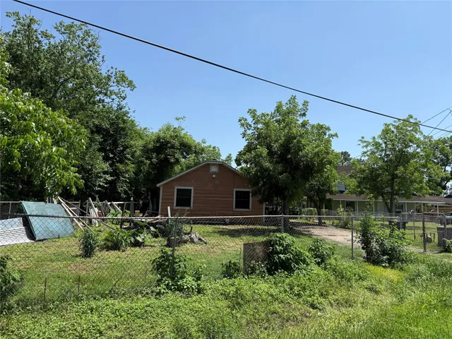 a house view with a garden space