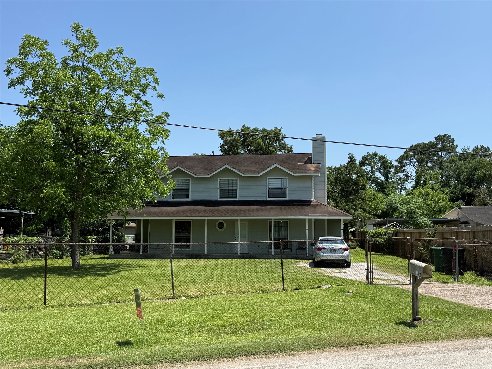 4312 Banner Drive Houston, TX 77013 - Photo 12 of 13 a front view of a house with a yard