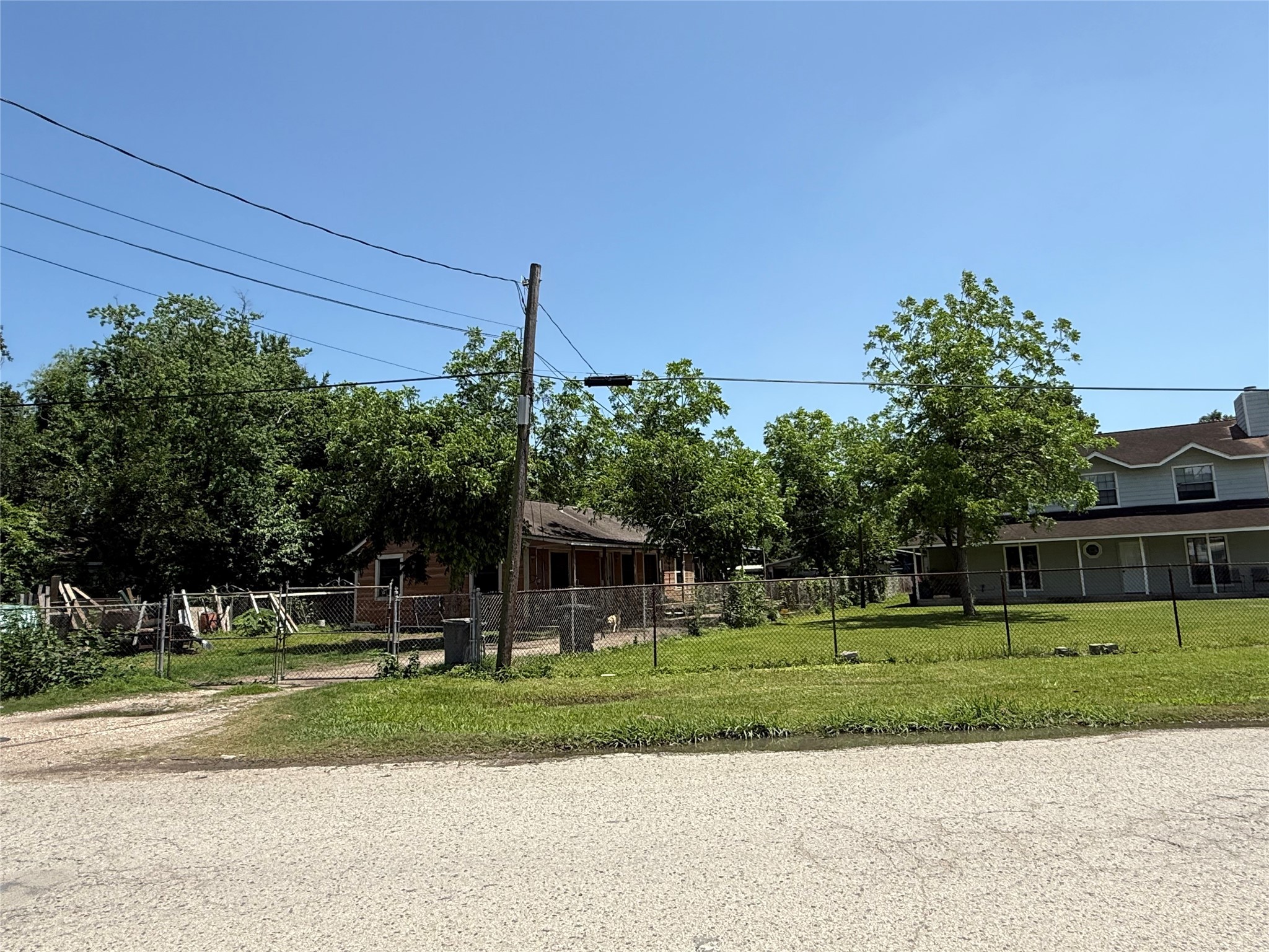 4312 Banner Drive Houston, TX 77013 - Photo 13 of 13 a front view of a house with a yard