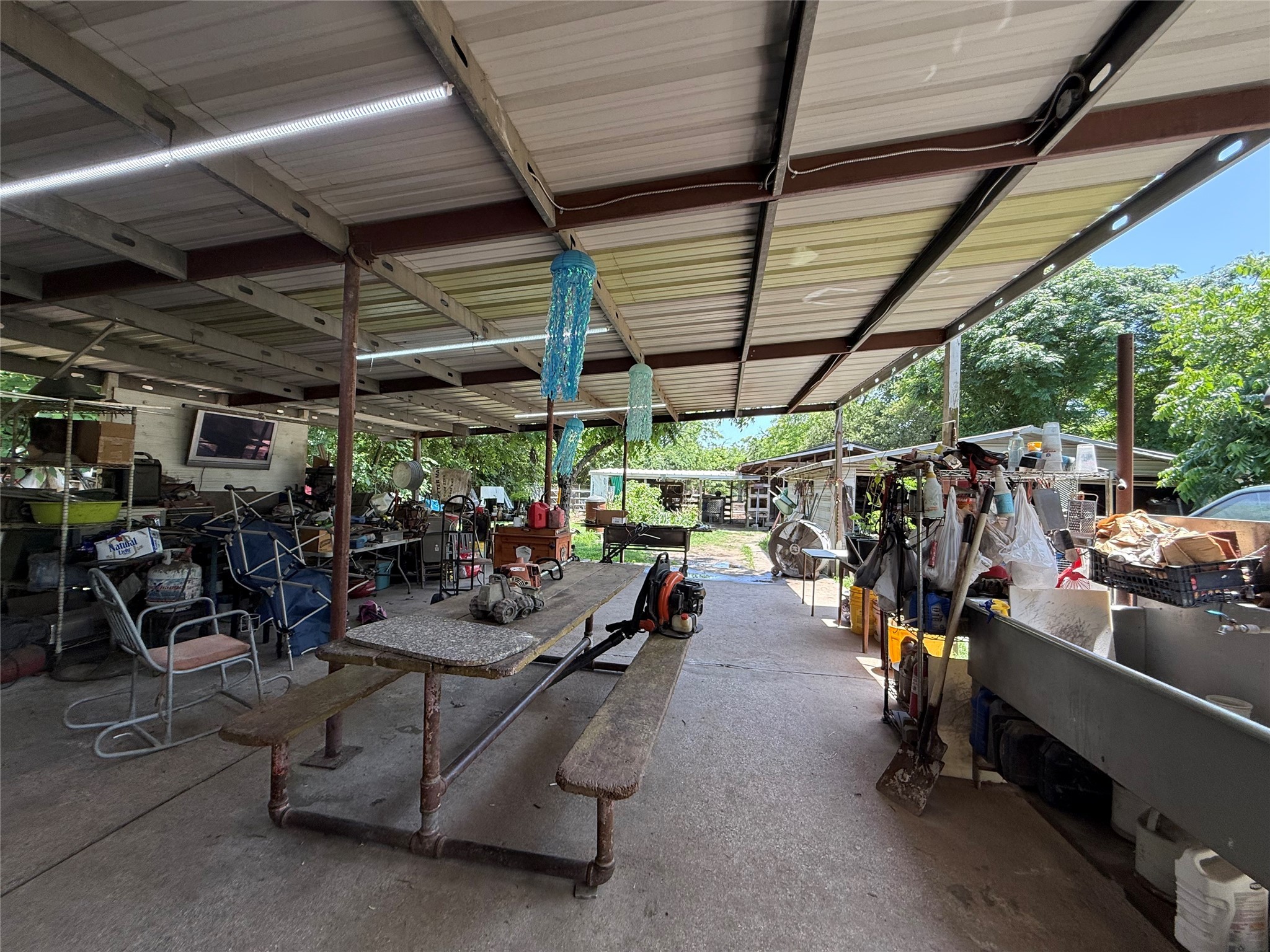 4312 Banner Drive Houston, TX 77013 - Photo 4 of 13 a view of a storage room with racks