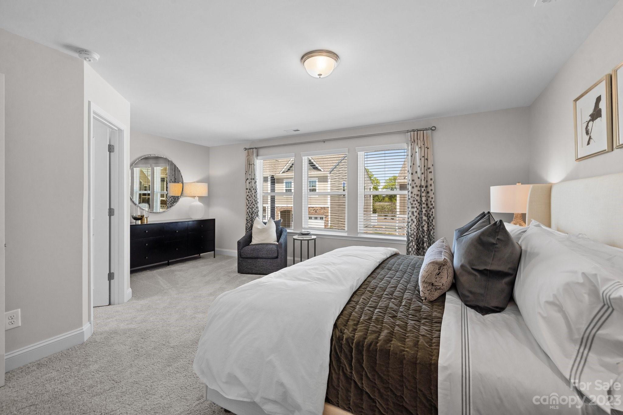 1031 South Point Road, Unit 9 Belmont, NC 28012 - Photo 17 of 21 a bedroom with a bed and window