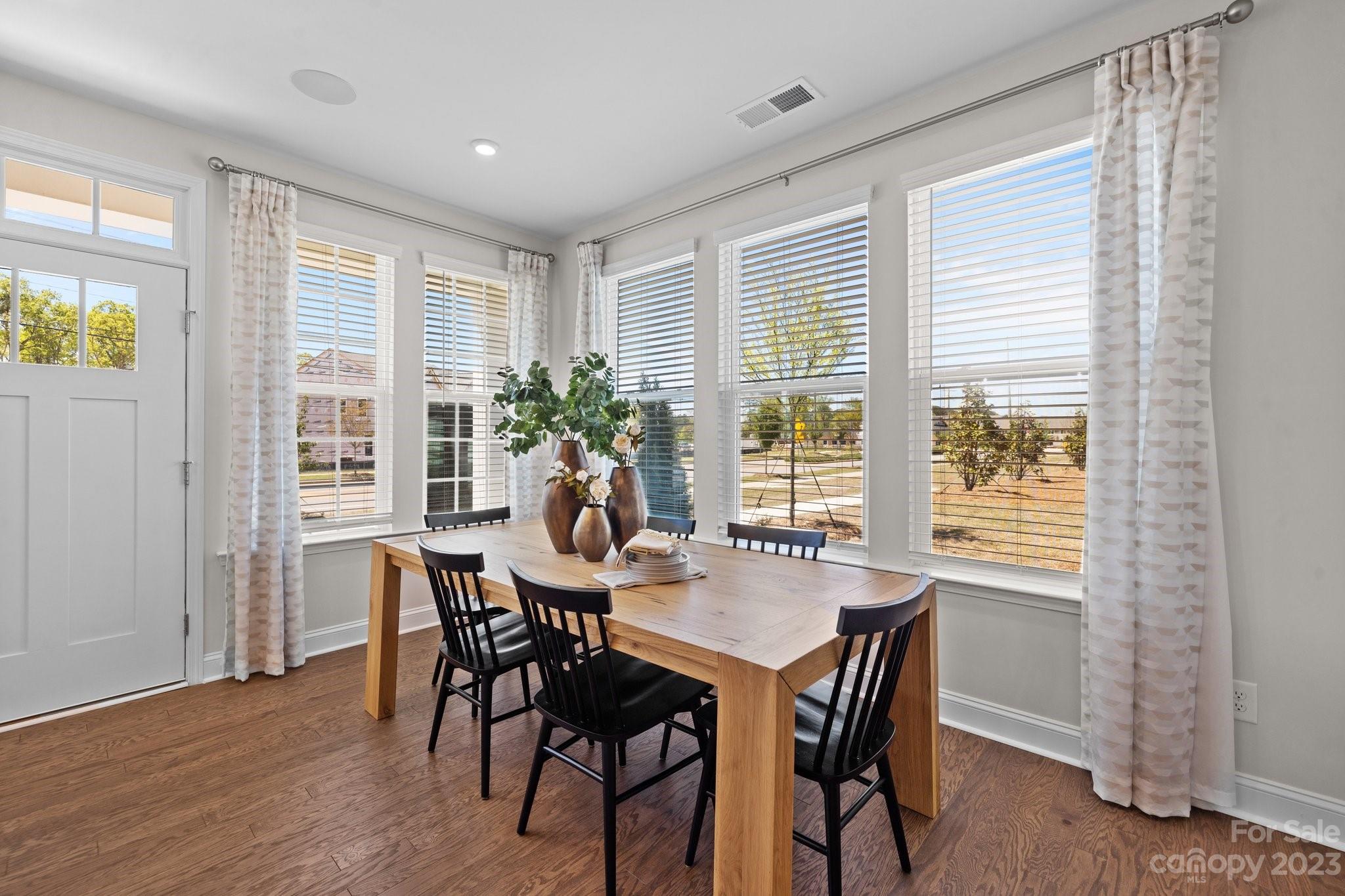 1031 South Point Road, Unit 9 Belmont, NC 28012 - Photo 10 of 21 a view of a dining room with furniture window and outside view