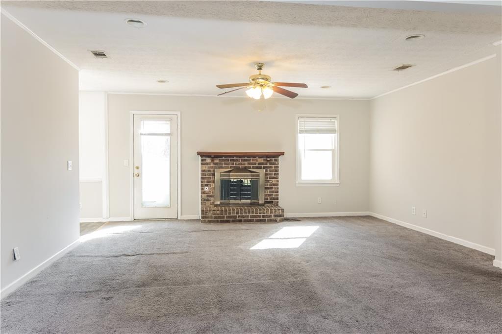 5422 Brookview Drive Columbus, GA 31907 - Photo 3 of 16 a view of empty room with a fireplace