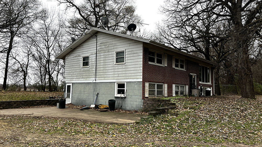 8919 Meredosia Road Albany, IL 61230 - Photo 2 of 35 a view of a house with a yard