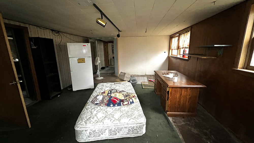 8919 Meredosia Road Albany, IL 61230 - Photo 29 of 35 a bed in a room next to a window