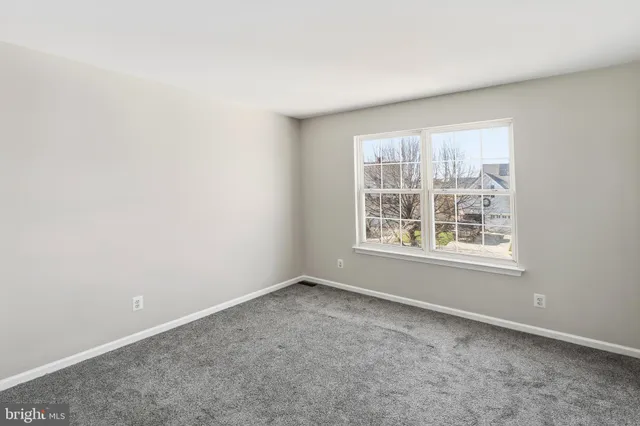 a living room with a large window
