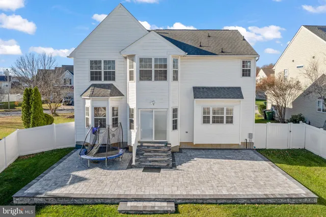 a view of a house with swimming pool