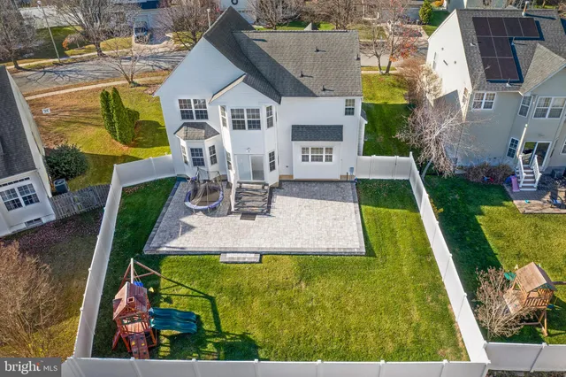 a front view of a house with swimming pool