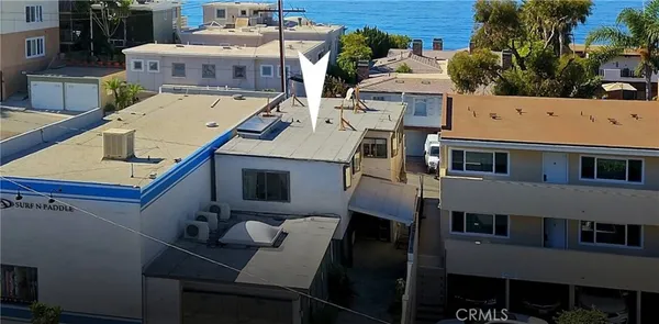 a aerial view of a house with a balcony