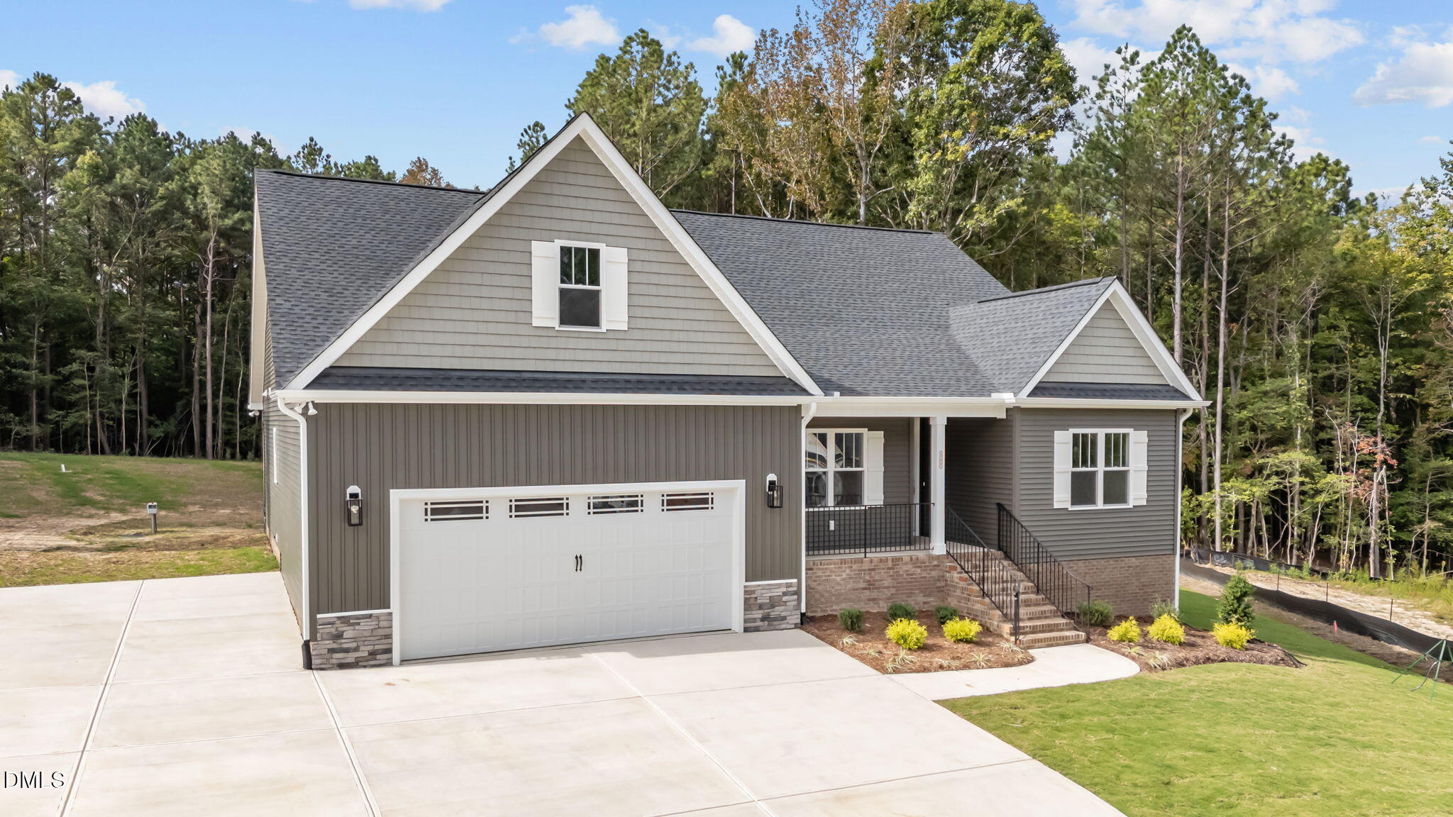 327 Little Lady Trail Zebulon, NC 27597 - Photo 5 of 49 a view of a house with a yard and fence