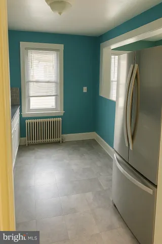 a view of empty room with windows