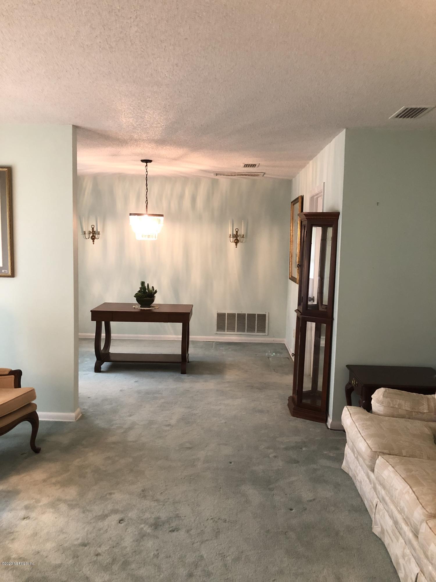 8974 Yarmouth Road Jacksonville, FL 32257 - Photo 4 of 26 3 LIVING ROOM TO DINING AREA