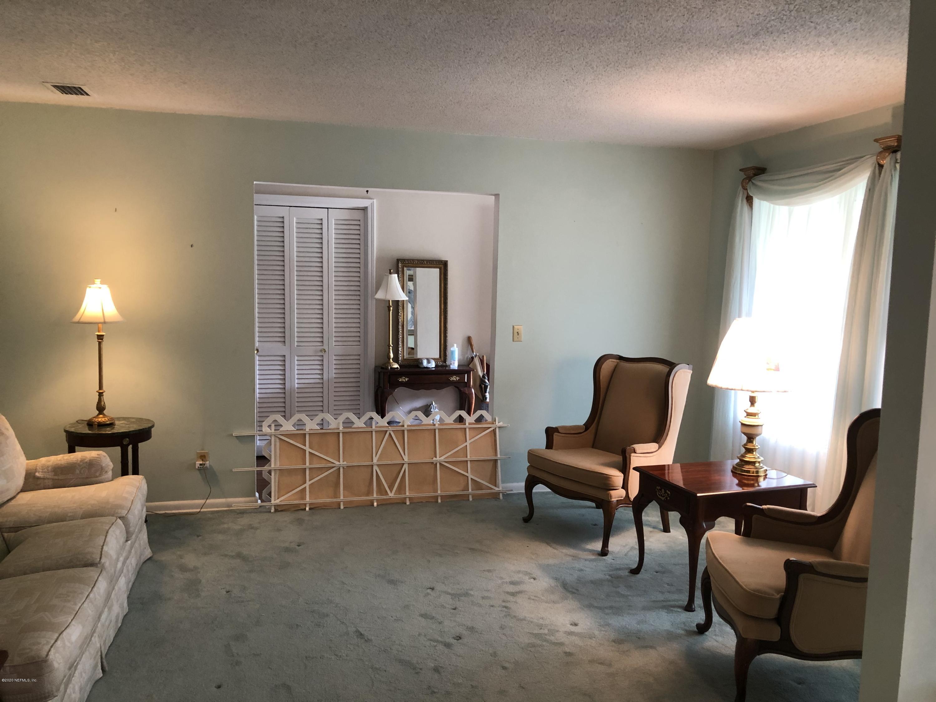 8974 Yarmouth Road Jacksonville, FL 32257 - Photo 5 of 26 3 LIVING ROOM FROM DINING AREA