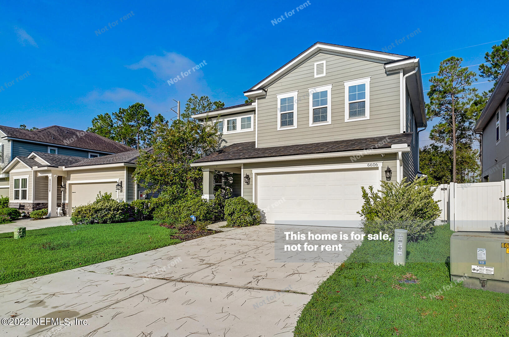 6606 Azalea Park Road Jacksonville, FL 32259 - Photo 3 of 26 a front view of a house with a yard