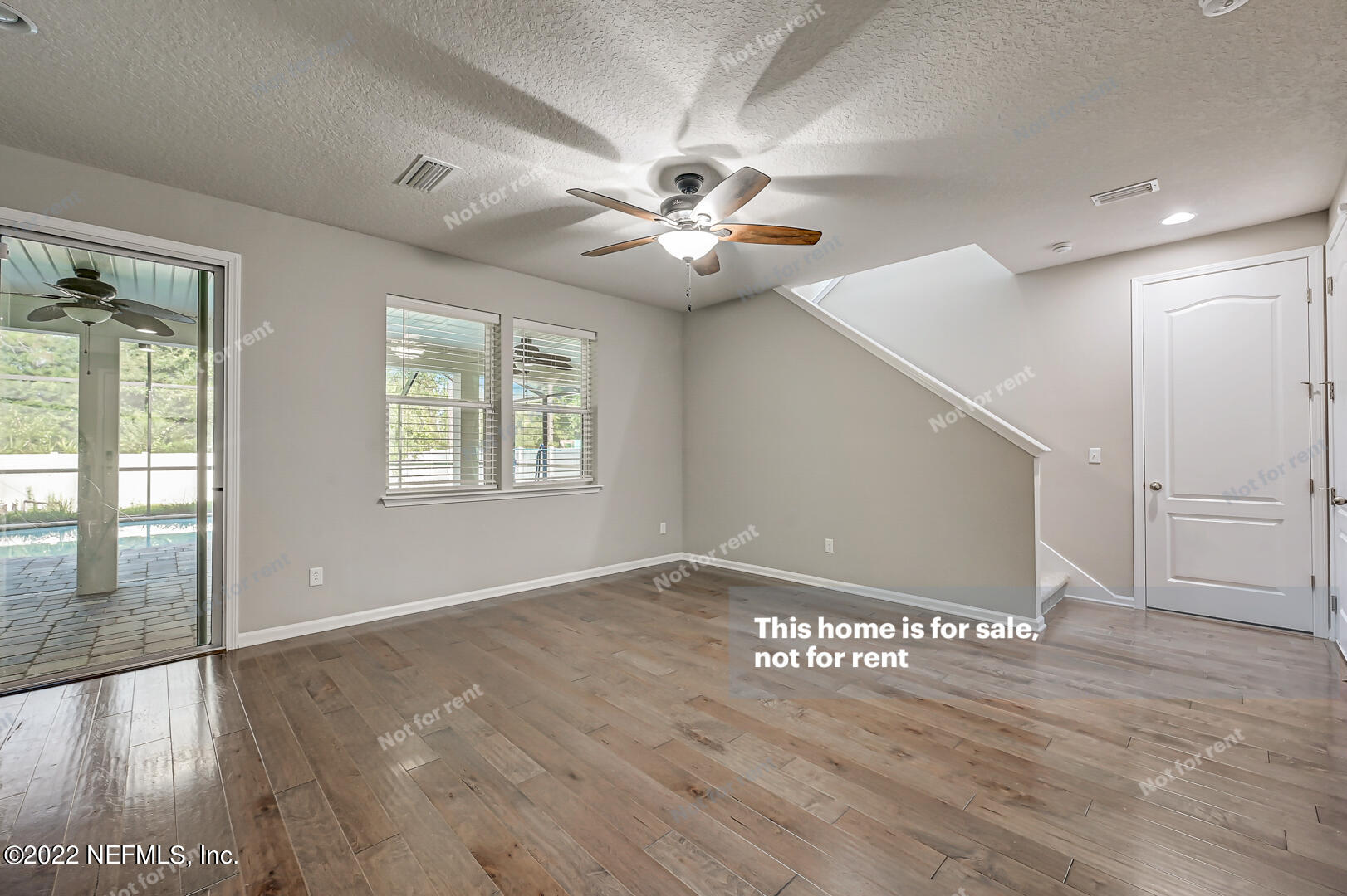 6606 Azalea Park Road Jacksonville, FL 32259 - Photo 9 of 26 wooden floor in an empty room with a window