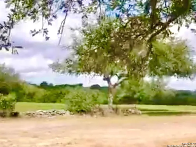 a view of a lake with houses in ocean