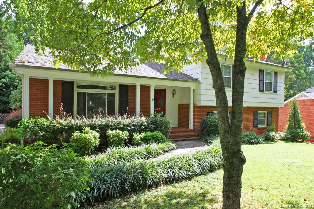 6723 Old Reid Road Charlotte, NC 28210 - Photo 2 of 7 front view of a house with a yard