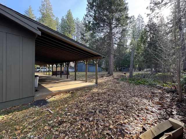 a backyard of a house with lots of green space