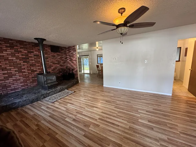 a view of outdoor space with wooden floor and stairs
