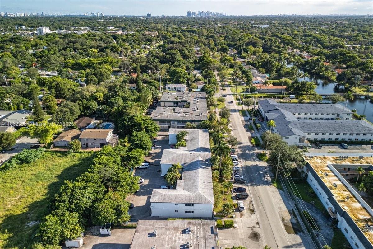 13201 Memorial Highway North Miami, FL 33161 - Photo 28 of 35 an aerial view of a city with lots of residential buildings