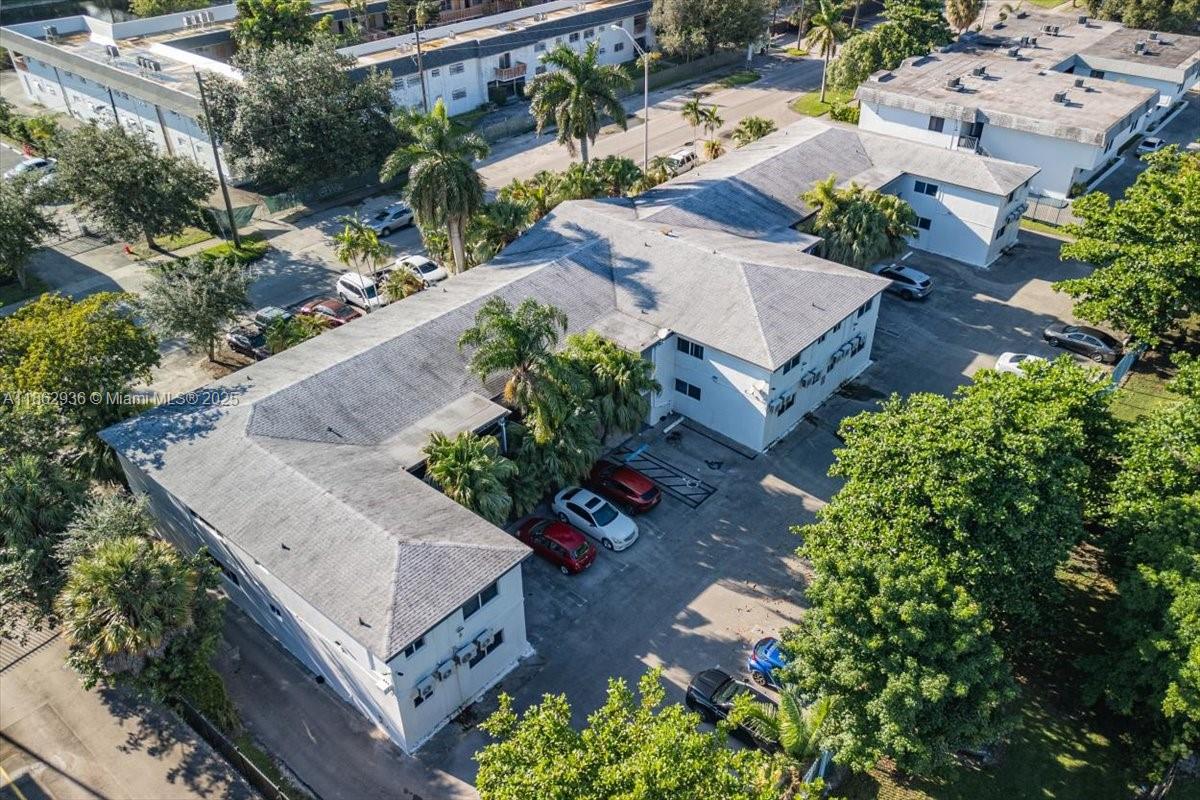 13201 Memorial Highway North Miami, FL 33161 - Photo 32 of 35 an aerial view of a house with a yard and a garden
