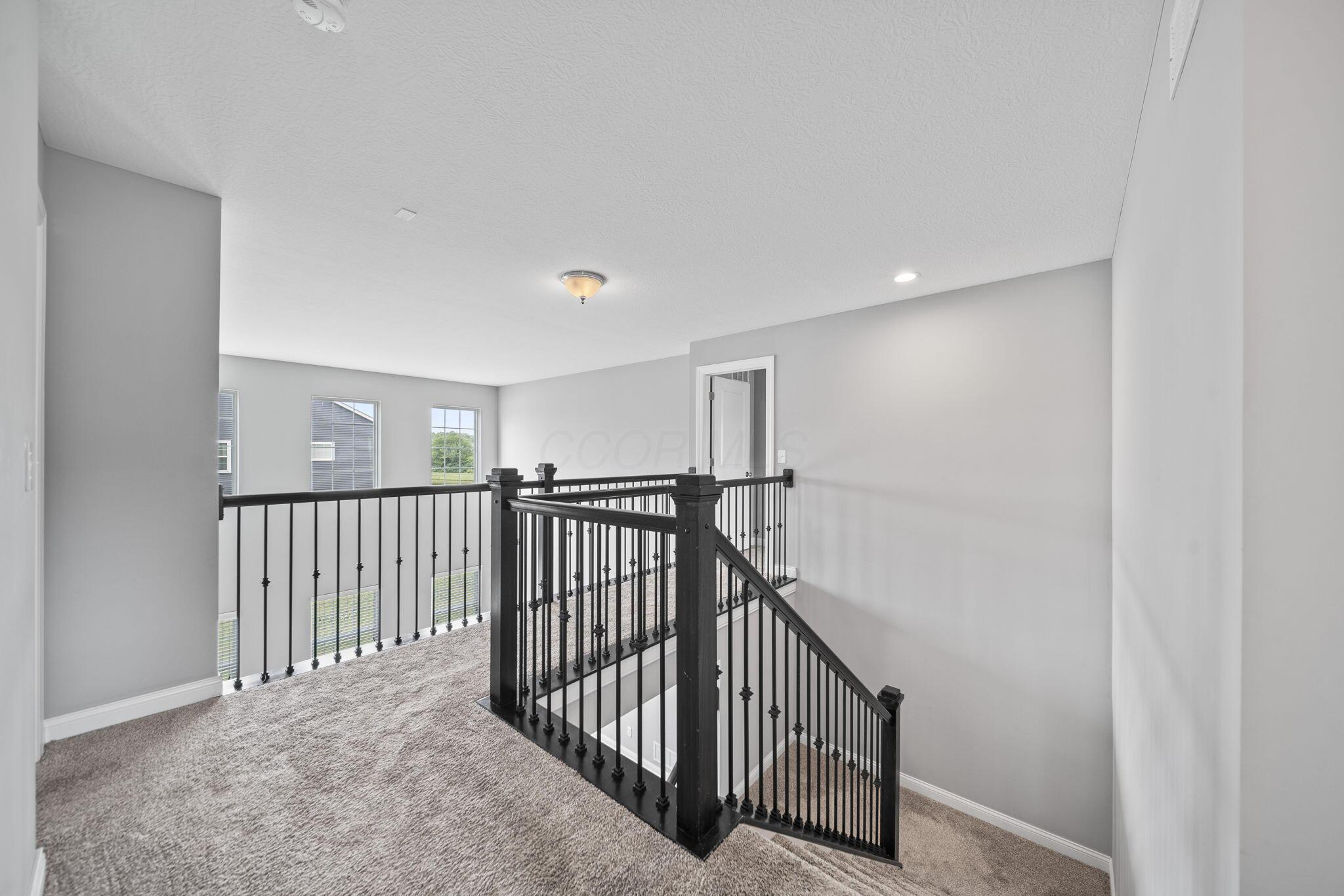 6158 Heather Ridge Drive Delaware, OH 43015 - Photo 25 of 51 Top of Stairs