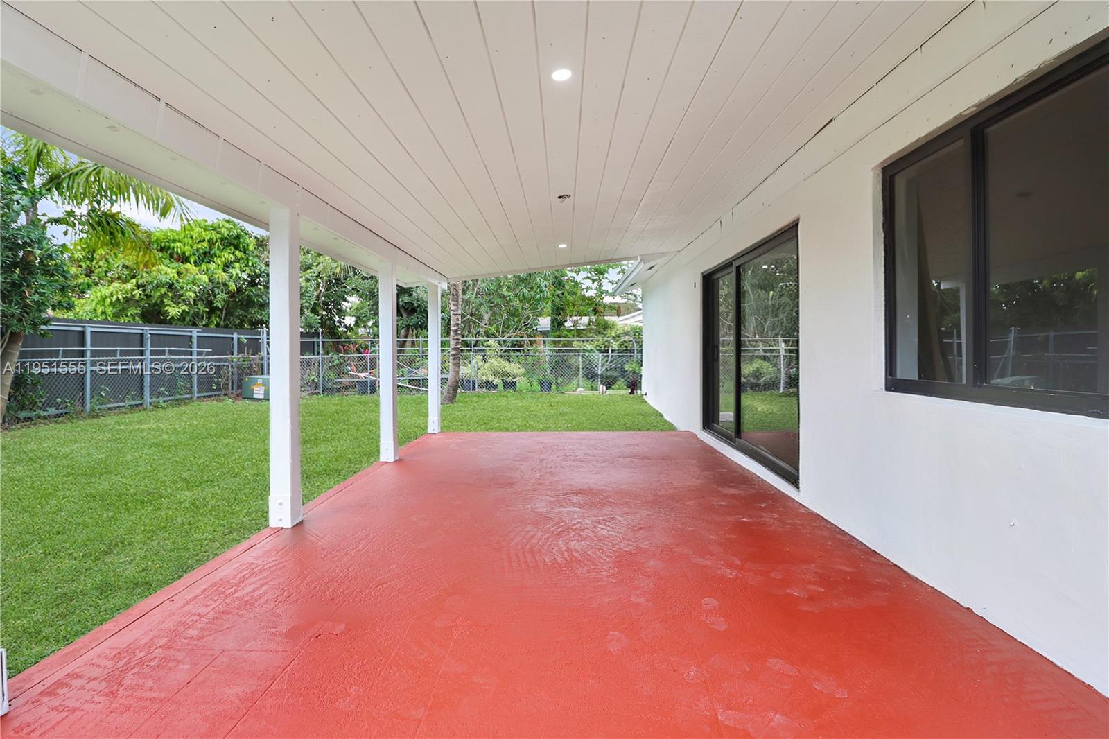 10944 Southwest 159th Terrace Miami, FL 33157 - Photo 21 of 25 a view of outdoor space with yard and trampoline