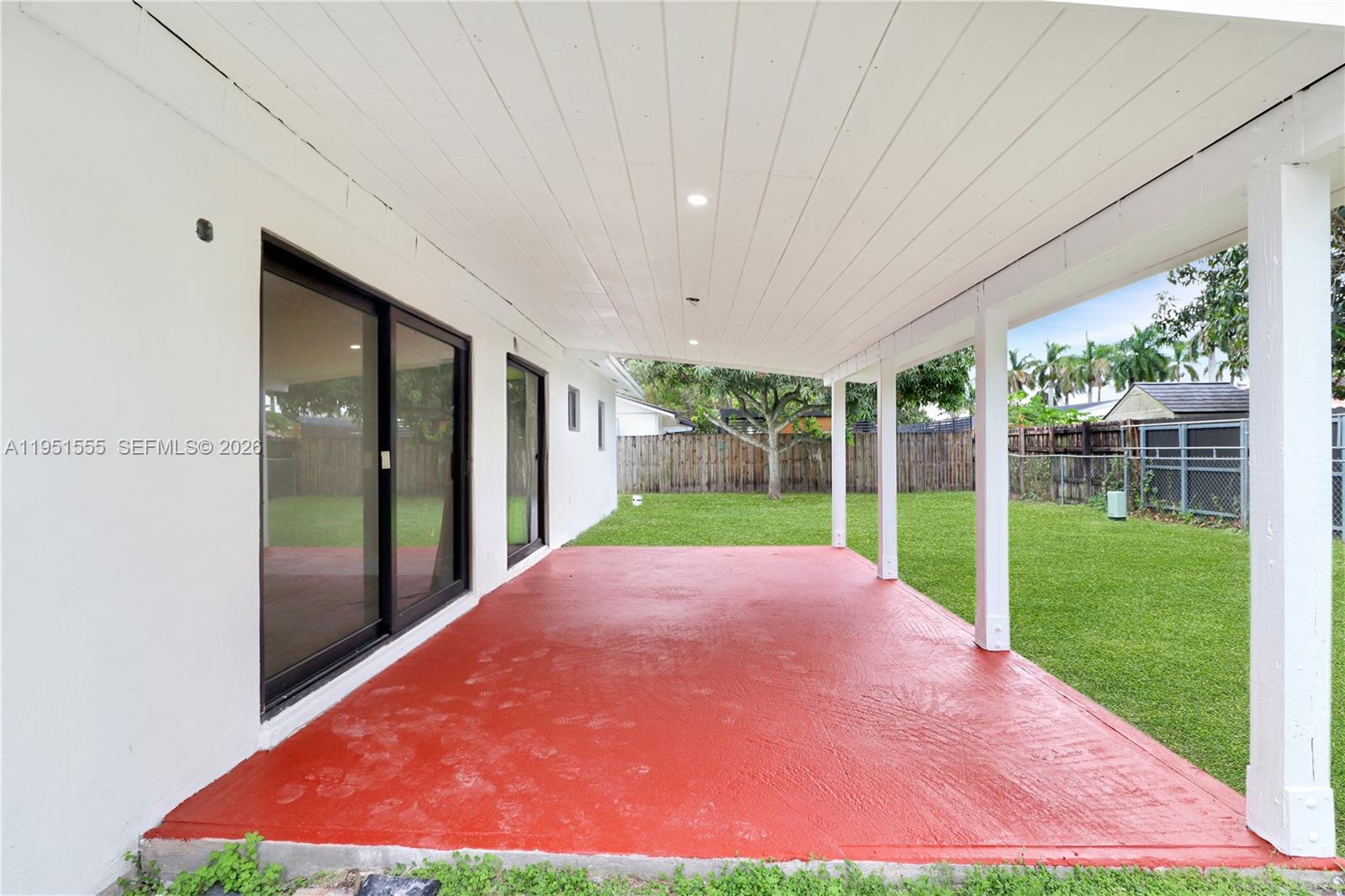 10944 Southwest 159th Terrace Miami, FL 33157 - Photo 22 of 25 a view of a backyard with garden