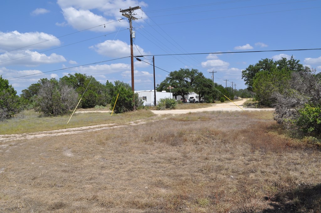 1608 Campfire Drive, Unit 10 Spring Branch, TX 78070 - Photo 11 of 13 a view of a road with a building in the background