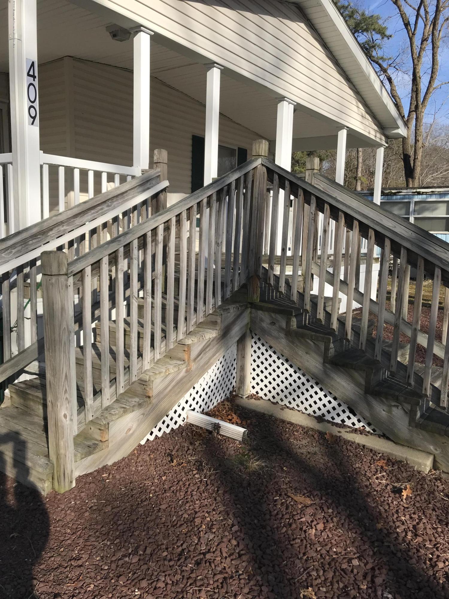 409 Roberts Road Toms River, NJ 08755 - Photo 2 of 34 a view of a back yard of the house