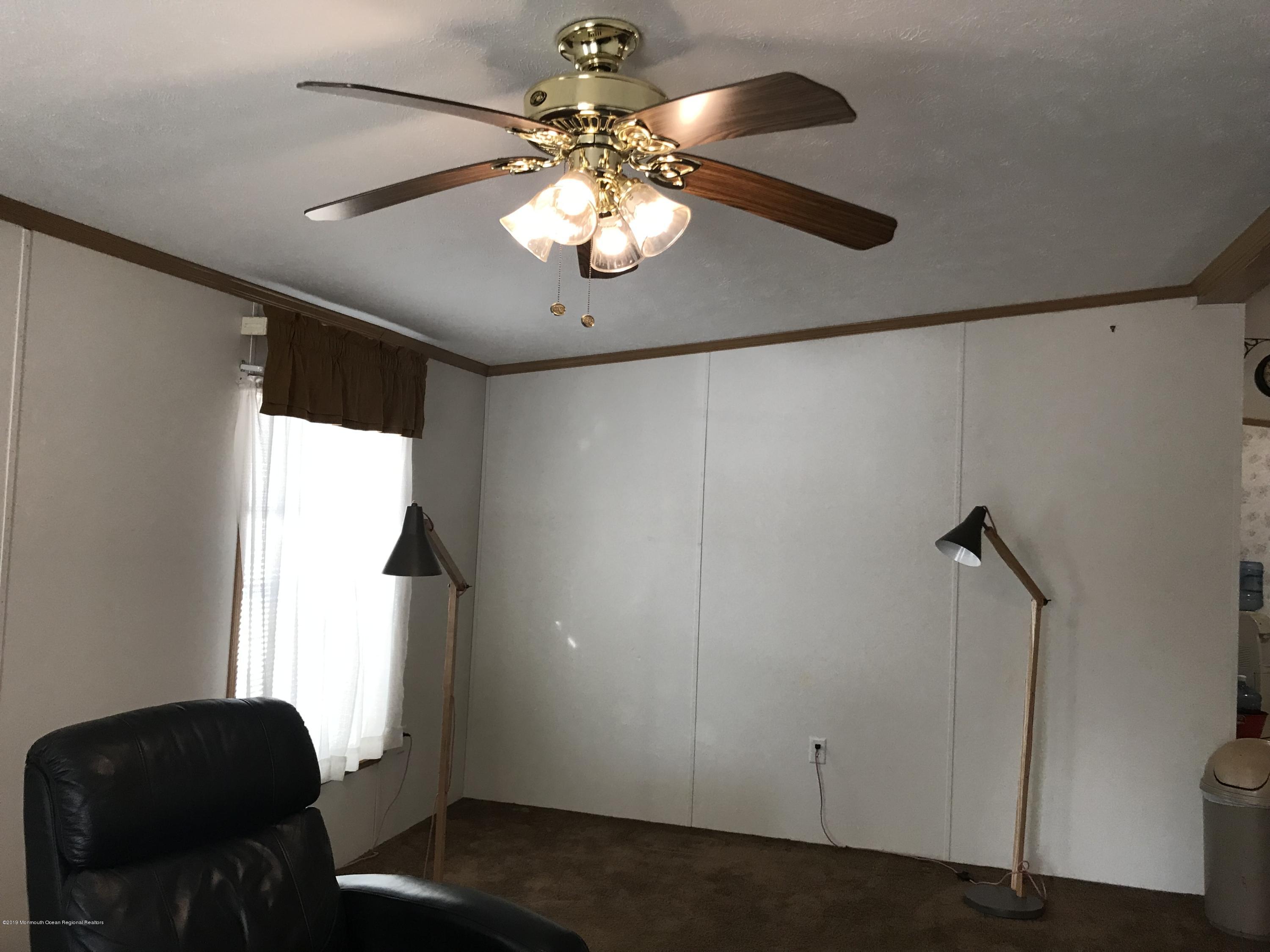 409 Roberts Road Toms River, NJ 08755 - Photo 7 of 34 a view of a livingroom with a window