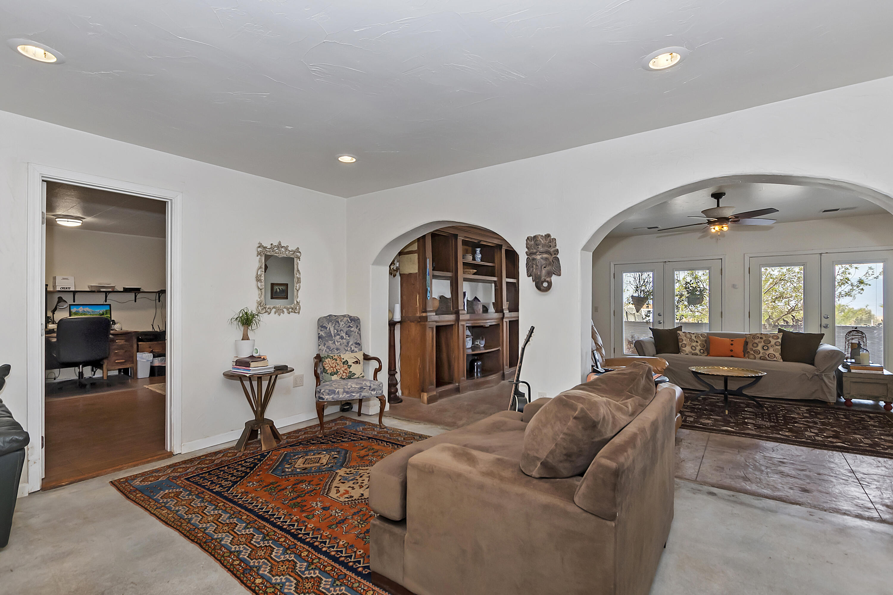 73315 Helms Road Desert Hot Springs, CA 92241 - Photo 12 of 41 a living room with furniture a dining table and wooden floor