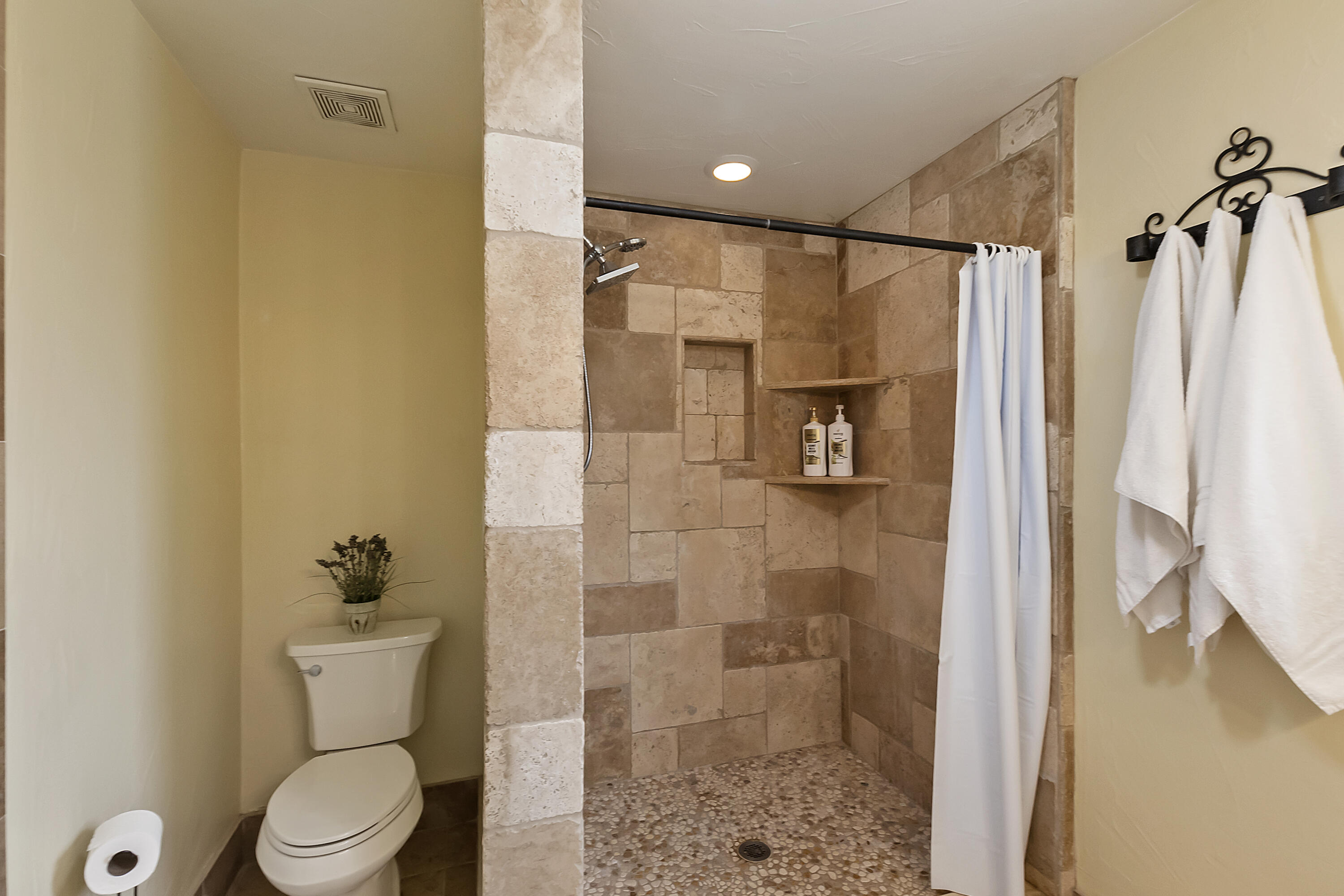 73315 Helms Road Desert Hot Springs, CA 92241 - Photo 24 of 41 a bathroom with a toilet and a shower