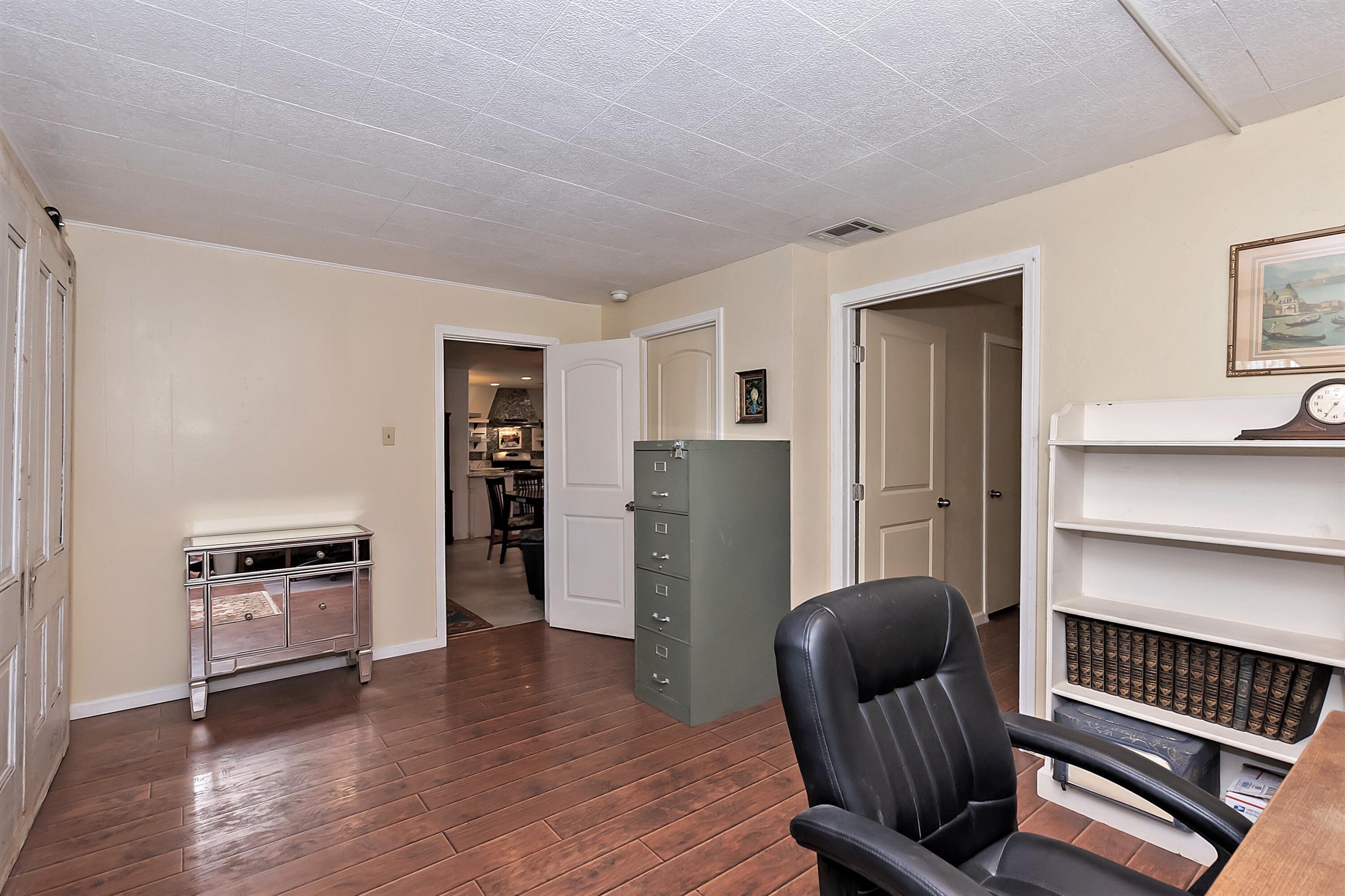 73315 Helms Road Desert Hot Springs, CA 92241 - Photo 28 of 41 a living room with furniture and a refrigerator