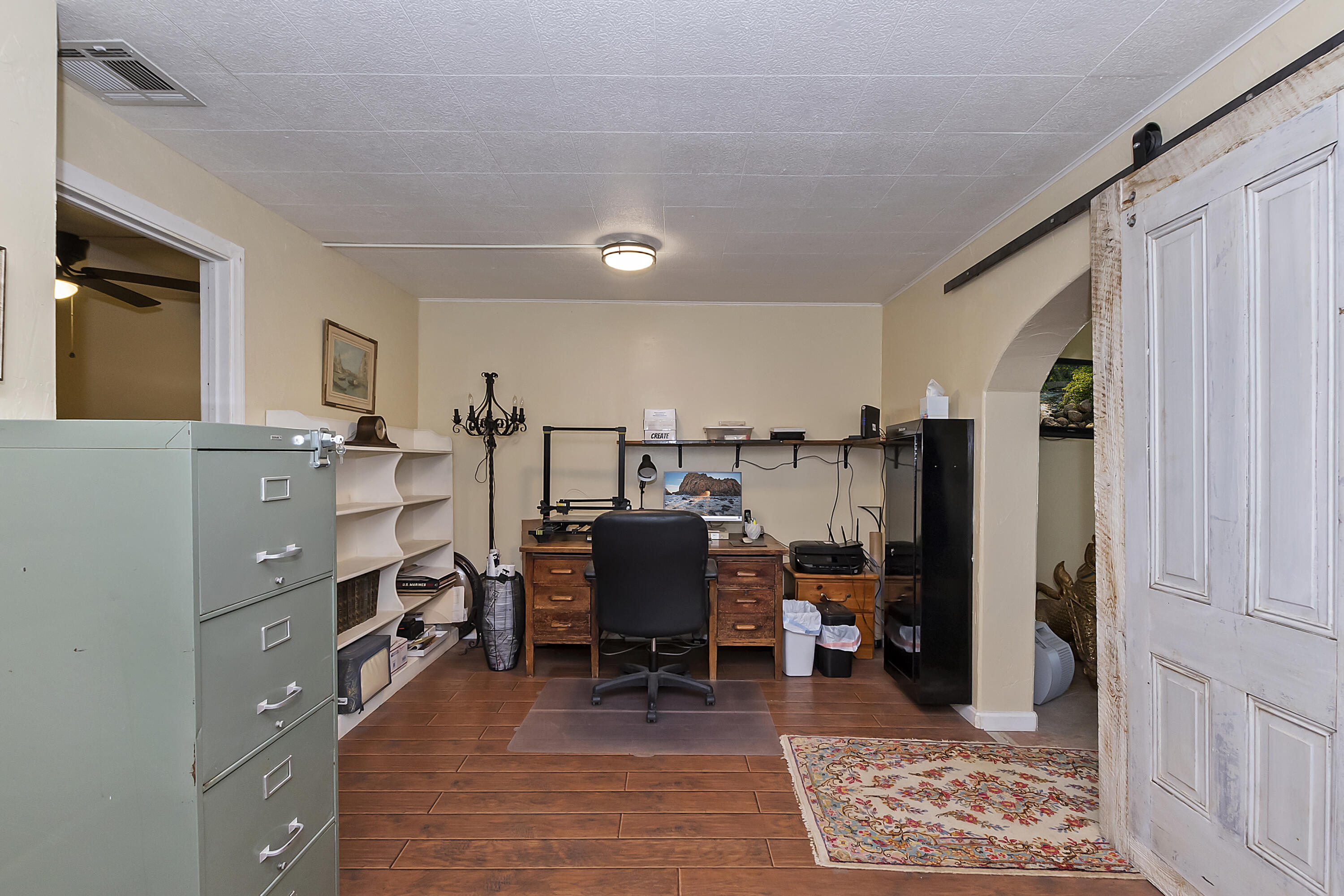 73315 Helms Road Desert Hot Springs, CA 92241 - Photo 29 of 41 a bedroom with furniture and a dresser