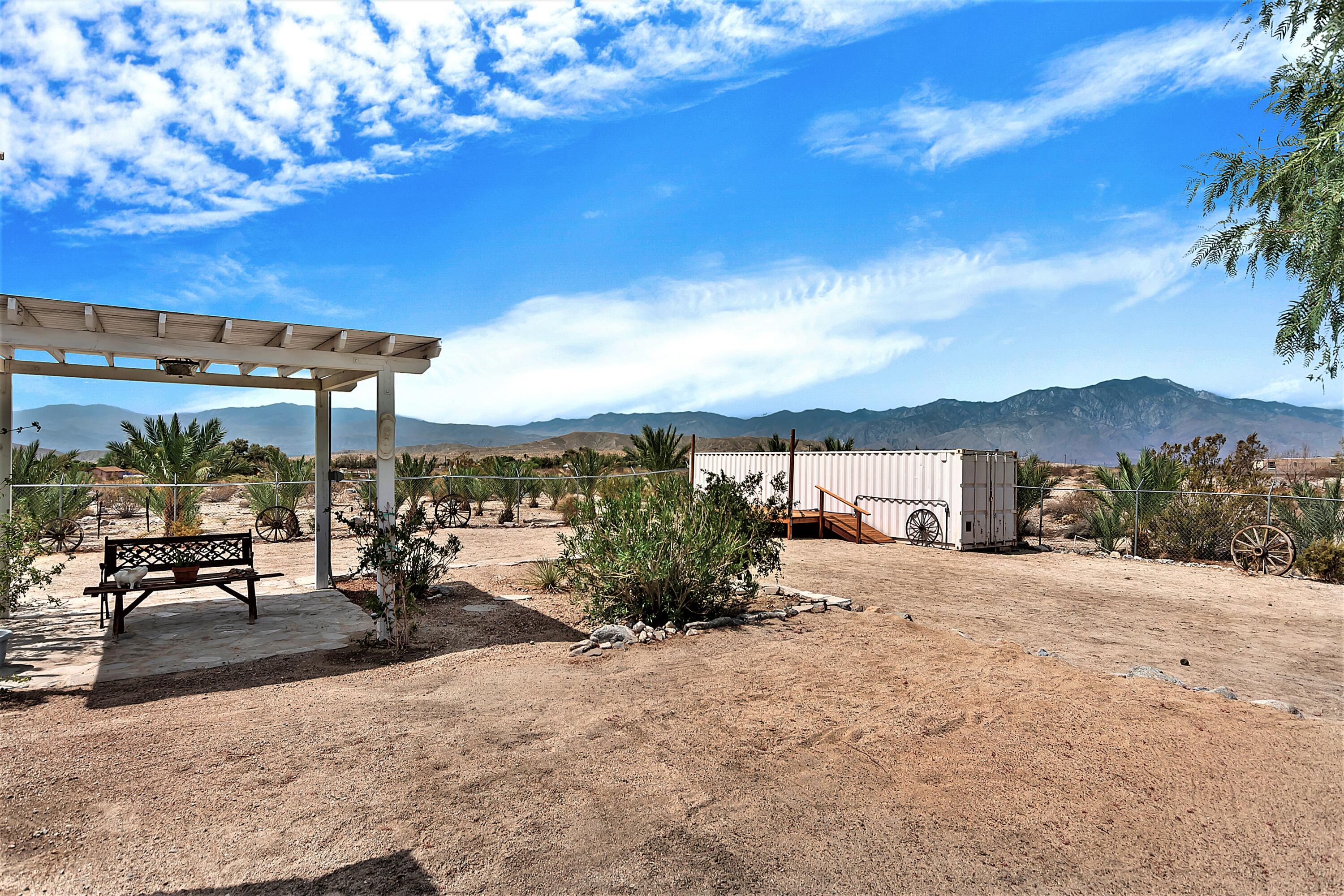 73315 Helms Road Desert Hot Springs, CA 92241 - Photo 35 of 41 a view of a terrace with sitting area