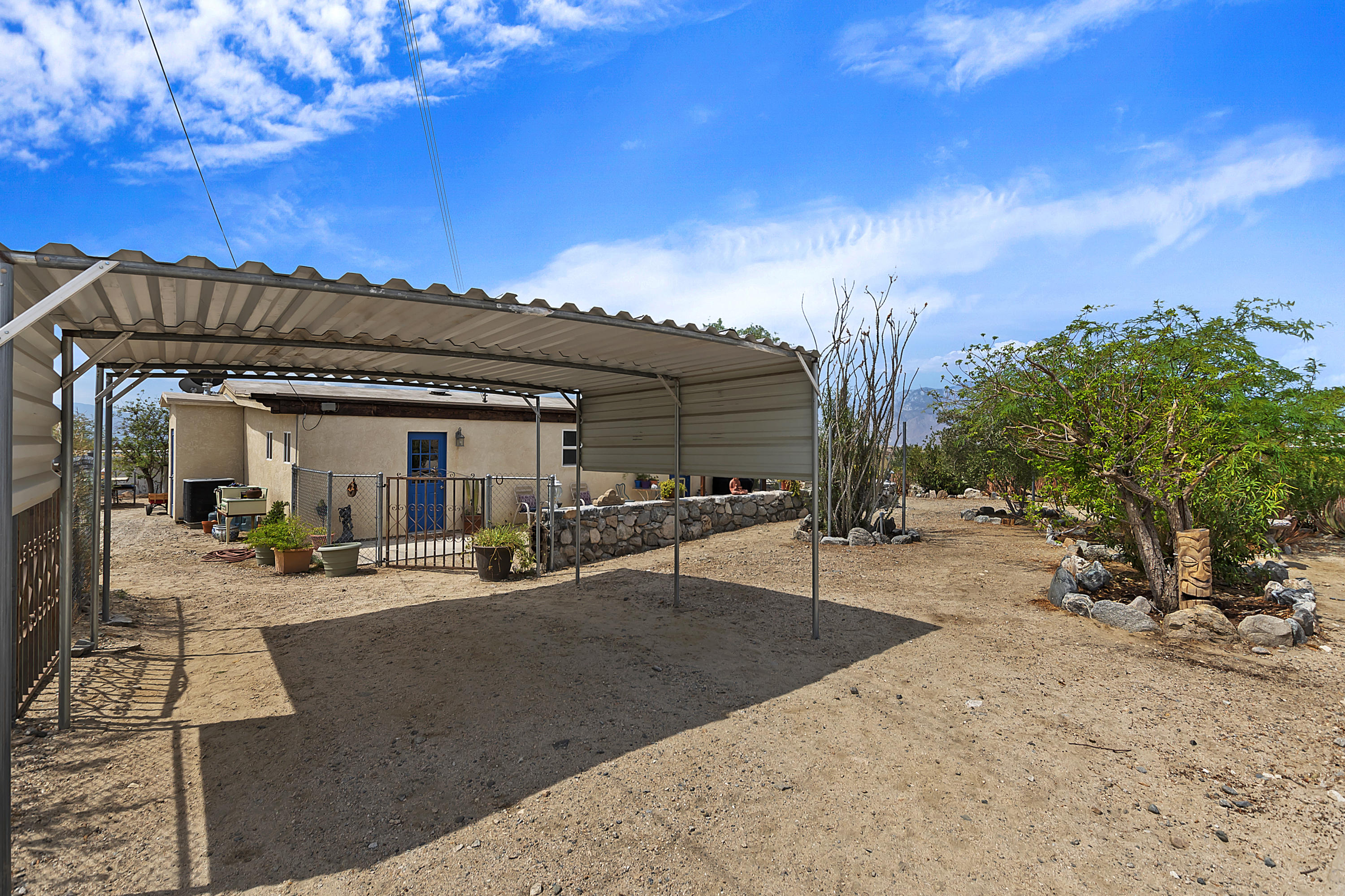 73315 Helms Road Desert Hot Springs, CA 92241 - Photo 5 of 41 a view of a house with patio