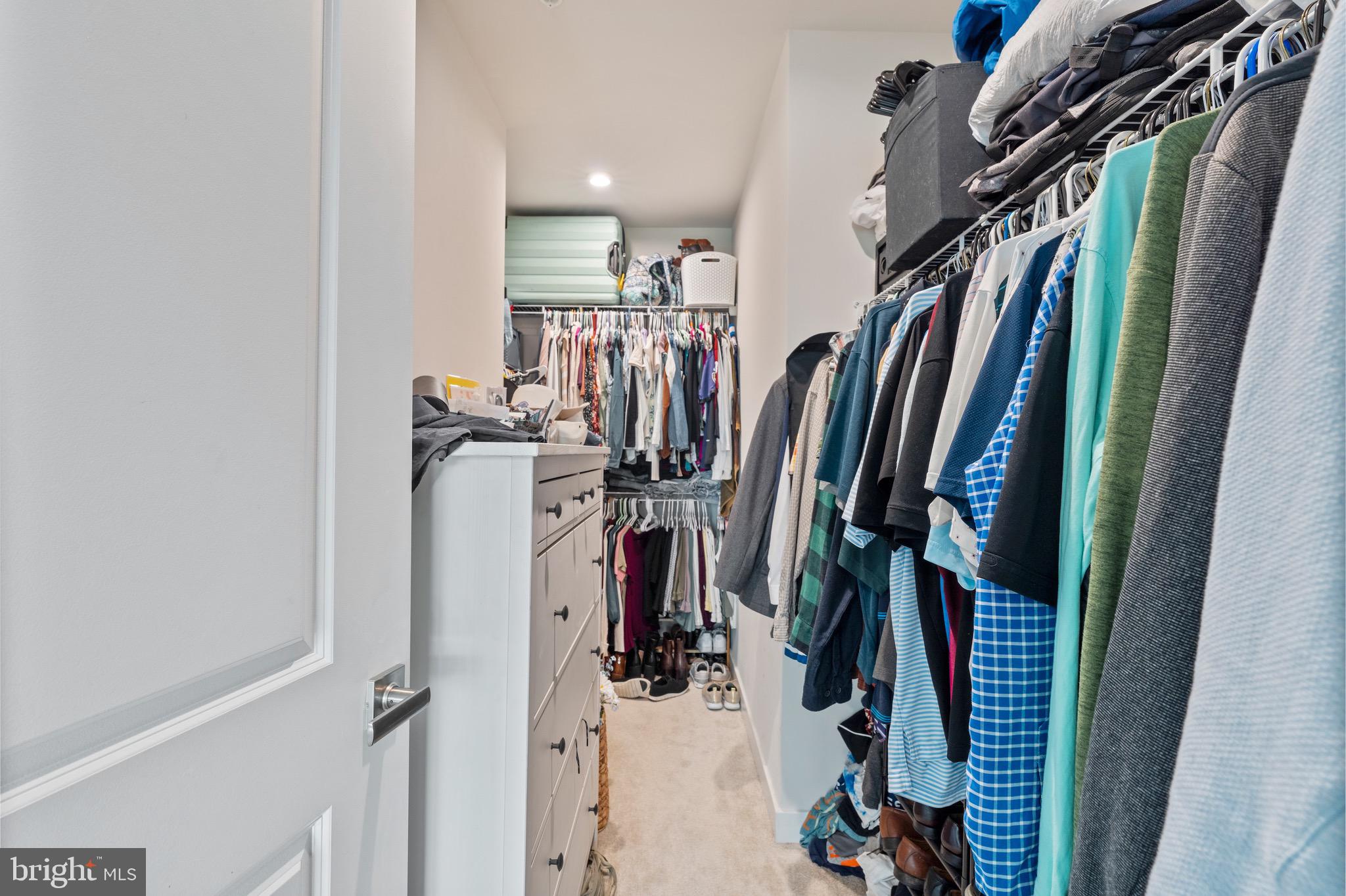 10411 Resort Road, Unit B Ellicott City, MD 21042 - Photo 11 of 36 a view of walk in closet with clothes