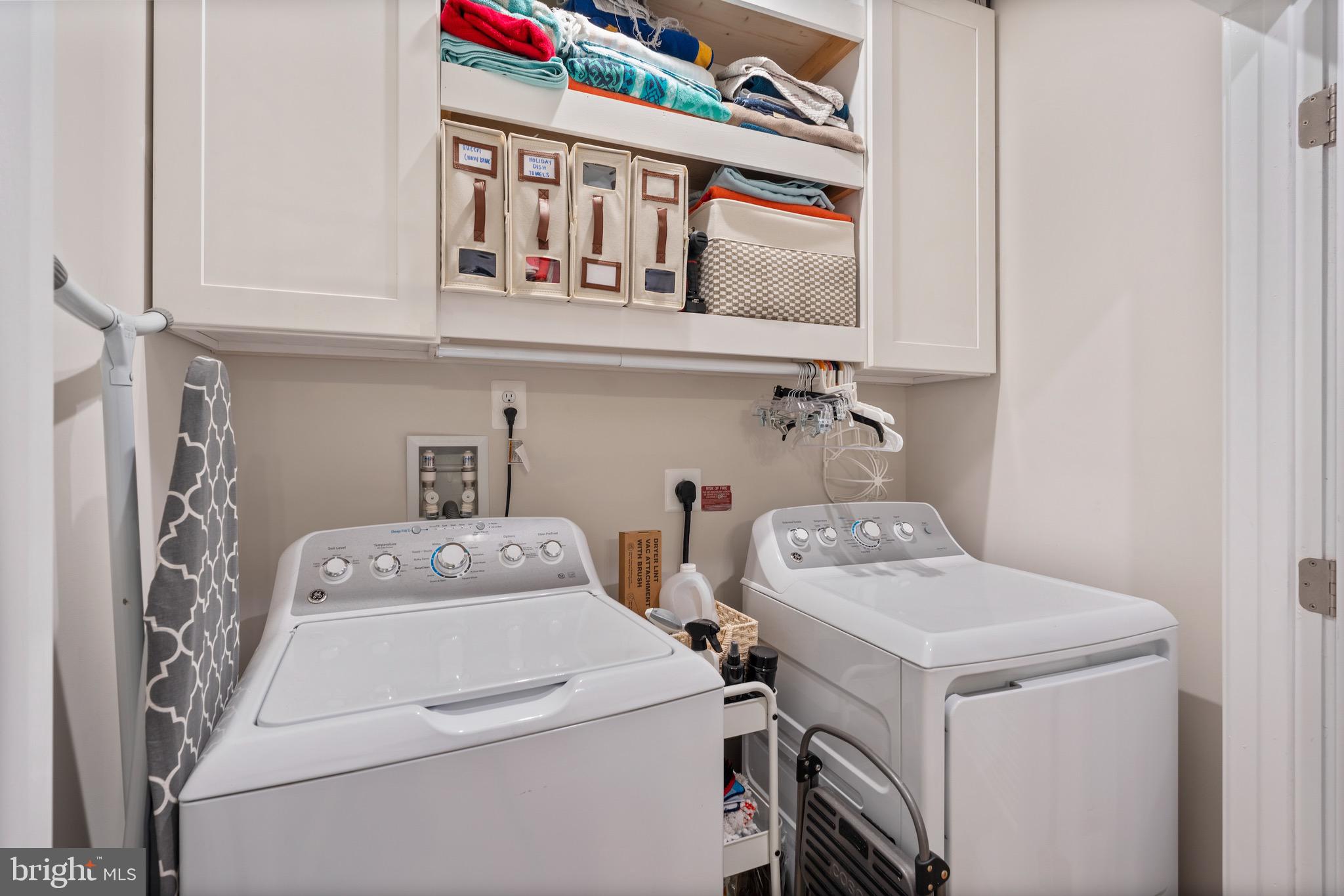 10411 Resort Road, Unit B Ellicott City, MD 21042 - Photo 22 of 36 a utility room with dryer and washer