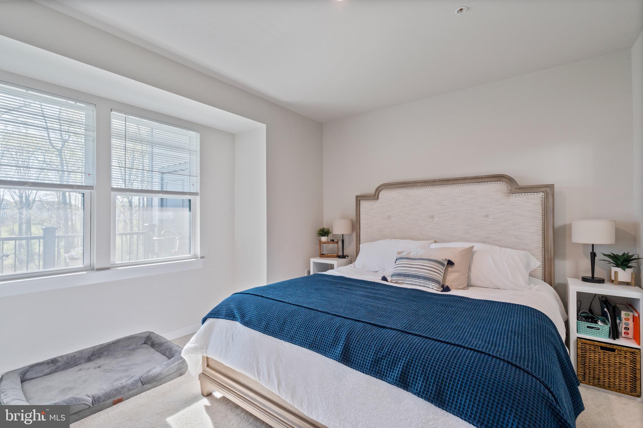 10411 Resort Road, Unit B Ellicott City, MD 21042 - Photo 8 of 36 a bedroom with a large bed and a window