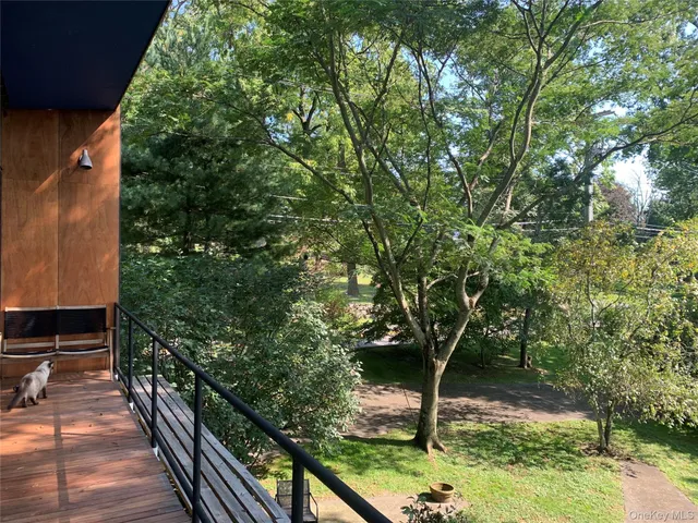 a bathroom with a sink vanity and mirror