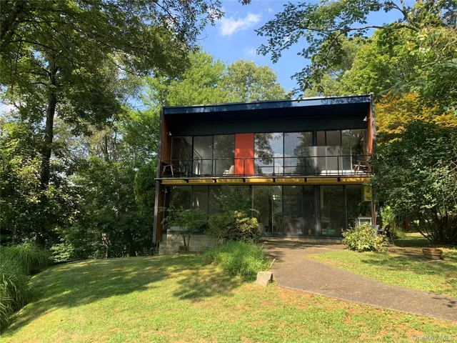 a view of a backyard of the house
