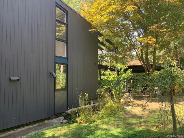 a yellow house with outdoor space