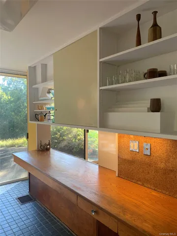 a kitchen with a sink and a stove