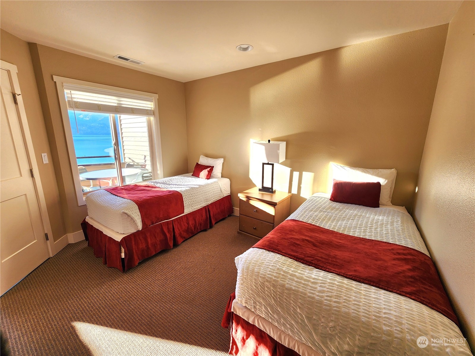 1 Lakeside 707-j Manson, WA 98831 - Photo 15 of 40 a bedroom with two beds and a couch