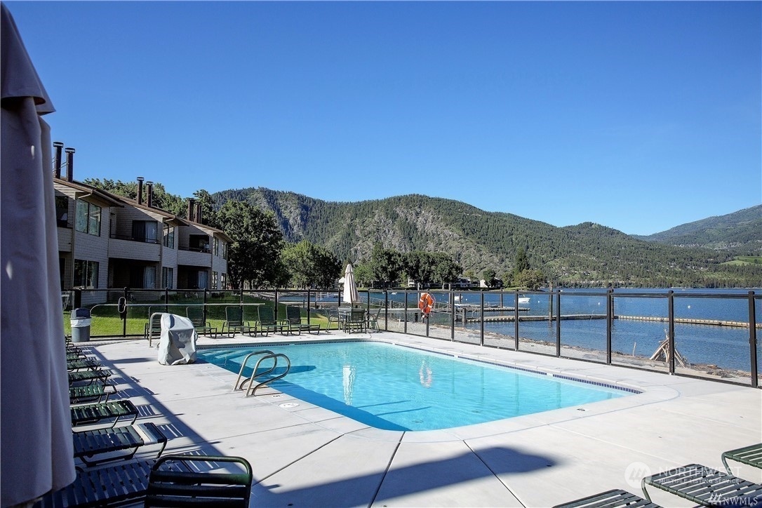 1 Lakeside 707-j Manson, WA 98831 - Photo 21 of 40 a view of a swimming pool with a patio