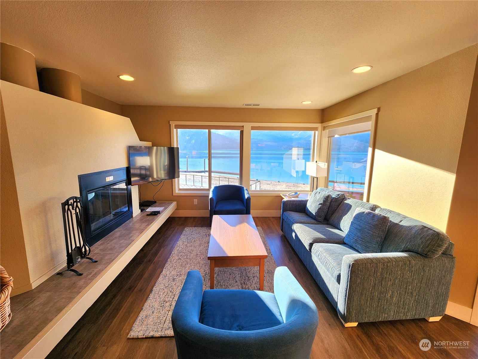 1 Lakeside 707-j Manson, WA 98831 - Photo 4 of 40 a living room with furniture and a flat screen tv